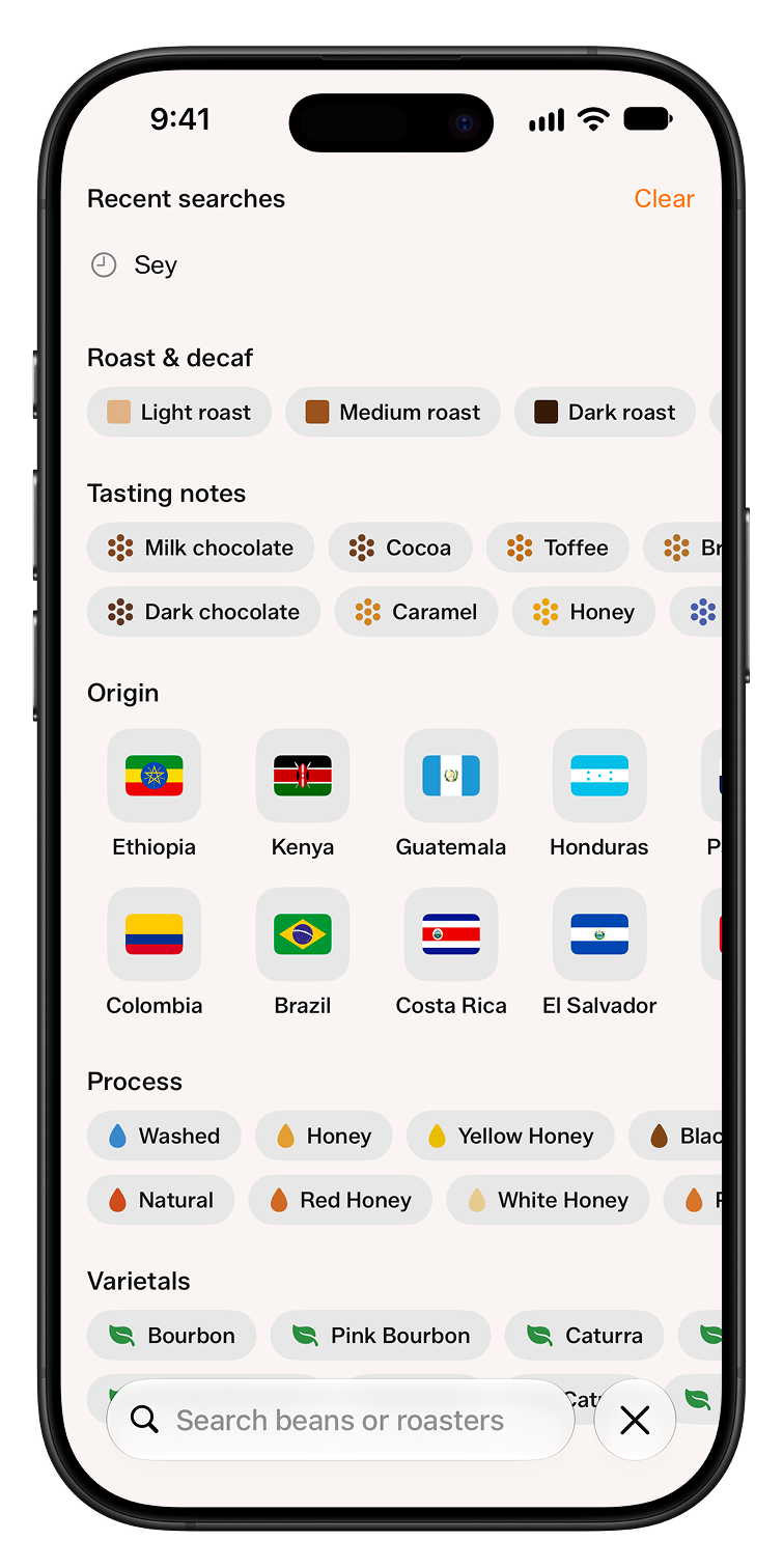 Search screen with recent searches and browse sections for roast and decaf, tasting notes, origin flags, process, and varietals